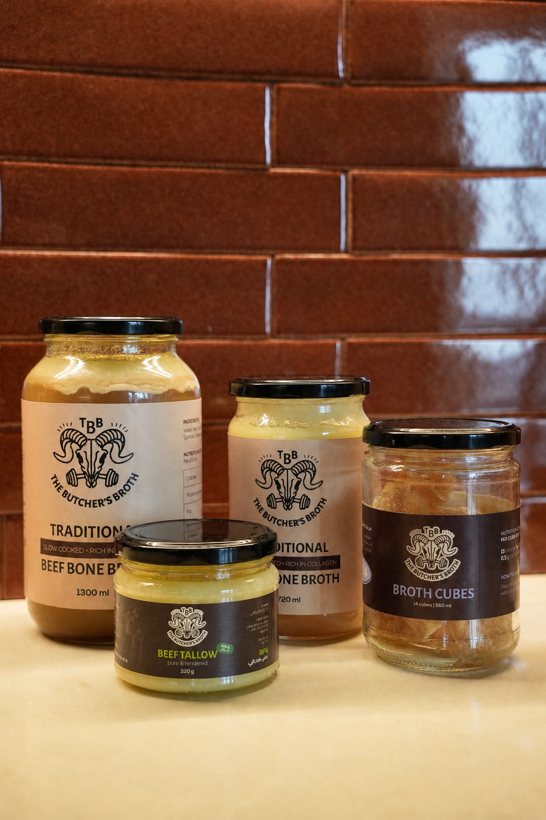 The Butcher's Broth range: 1300 ml and 720 ml jars of beef bone broth, beef tallow and broth cubes